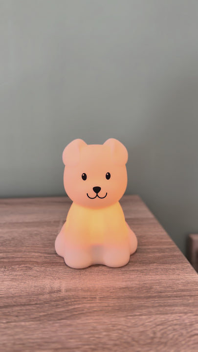 Video of the dog night light Bibi switching between different colors in a jumping color mode.